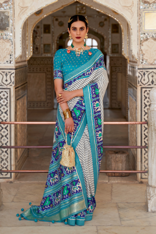 Sky Blue Colour Designer Patola Silk Saree with Blouse Piece