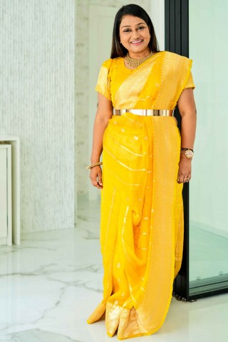 Dolly Jain & Shreya Ghoshal's Yellow Banarasi Organza Saree