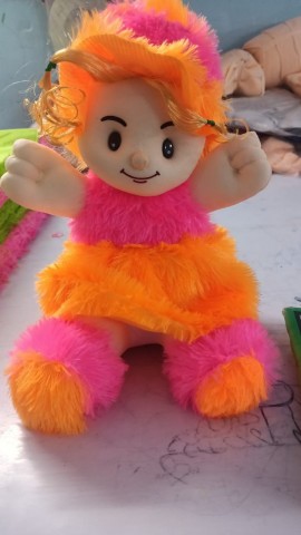 Fur sitting doll