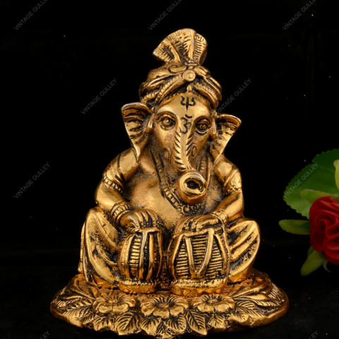 White Metal Golden Ganesha with Damru