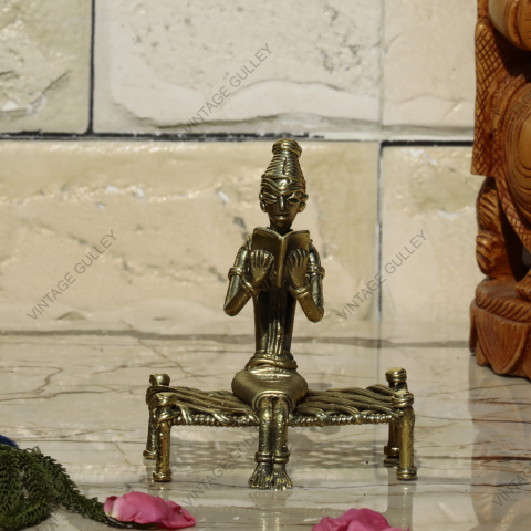 Brass Dhokra Lady Reading On Bed